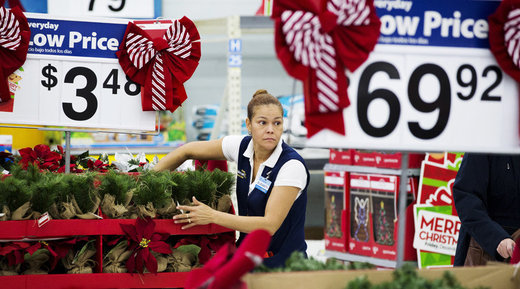 Walmart slave handling Christmas decorations