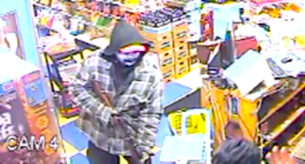 masked gunman robs liquor store