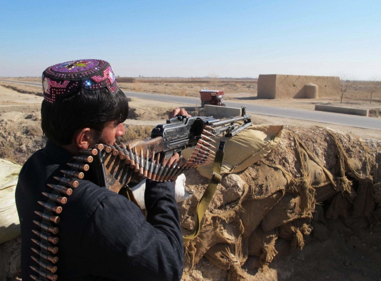 Click to enlarge Afghan police officer