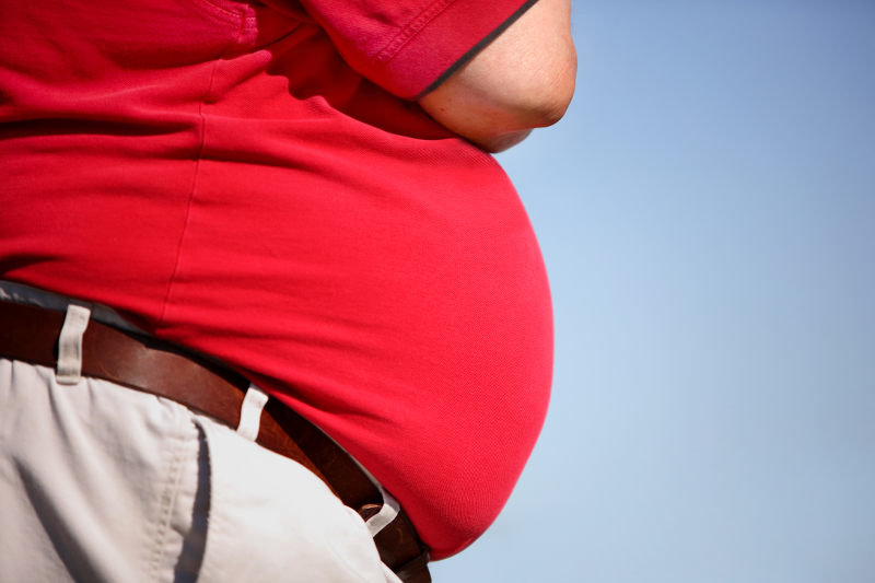 Click to enlarge Obese man