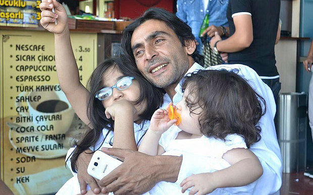 Naji Jerf with his daughters