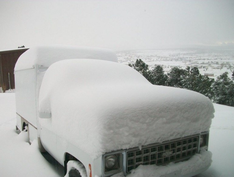 Snow covers truck