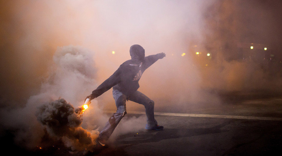 Click to enlarge protester gas canister