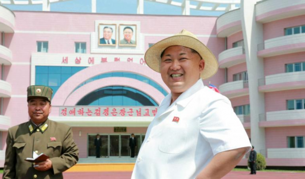 Click to enlarge Smiling Kim Jong-un