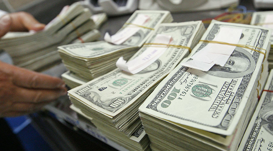 stacks of hundred dollar bills