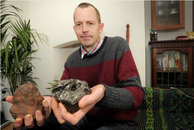David Butland with some of the meteorites he has collected previously 