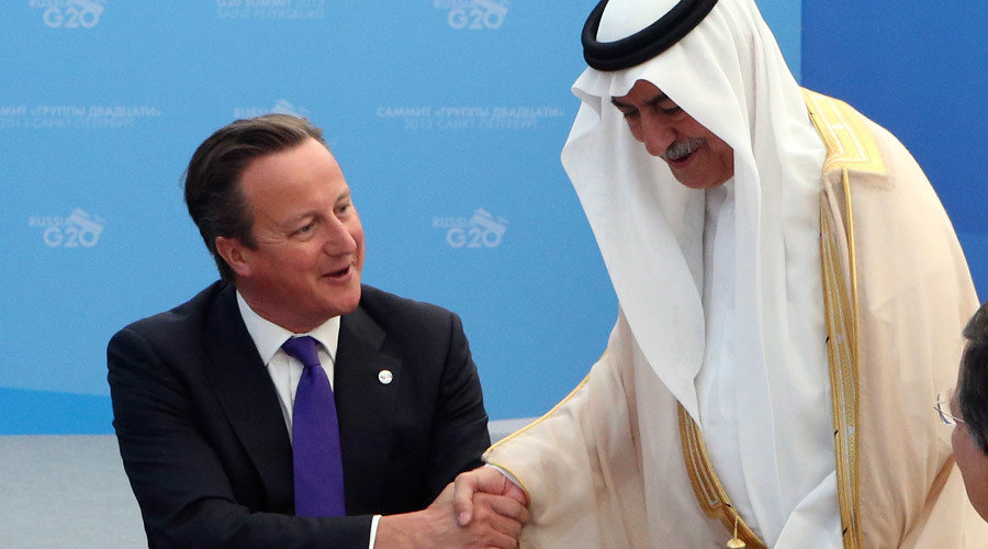 British Prime Minister David Cameron (L) and Saudi Arabia's Finance Minister Ibrahim Al-Assaf 