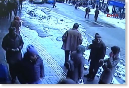 Snow falls on shoppers