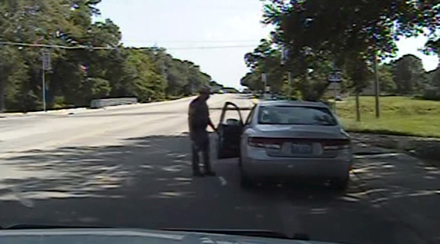 Click to enlarge Texas state trooper Brian Encinia opens the driver's side door as he orders Sandra Bland out of her vehicle, in this still image captured from the police dash camera video from the traffic stop of Bland's vehicle in Prairie View, Texas, July 10, 2015