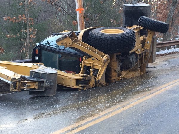 Backhoe in sinkhole