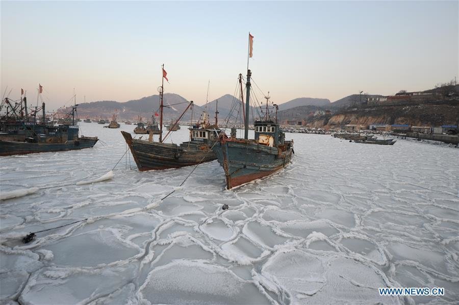 Fishing boats trapped in sea ice, China
