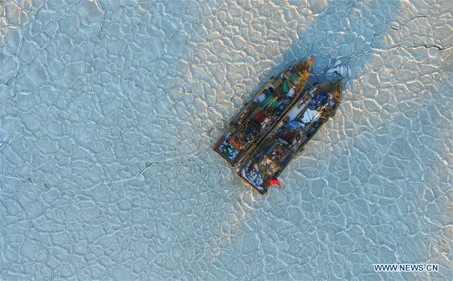 Fishing boats trapped in sea ice, China