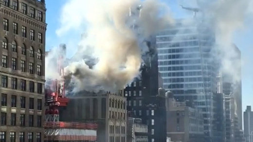Manhattan crane catches fire