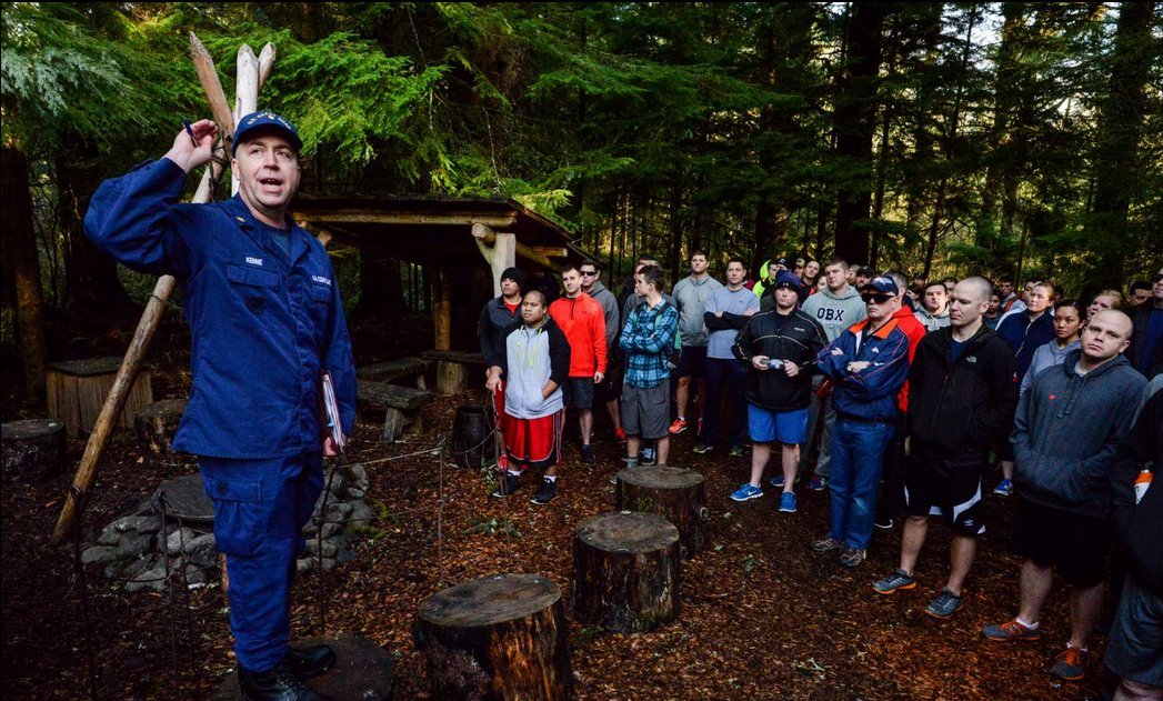 Anthony Kenne, chief of planning and force readiness with the U.S. Coast Guard Columbia River sector, speaks to members of the Coast Guard about available shelter and supplies at Fort Clatsop National Historical Park in Warrenton during a tsunami prepared