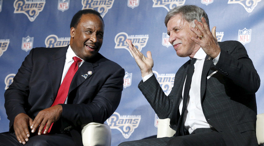Los Angeles Rams owner Stan Kroenke (R) laughs with Inglewood mayor James T. Butts, Jr.