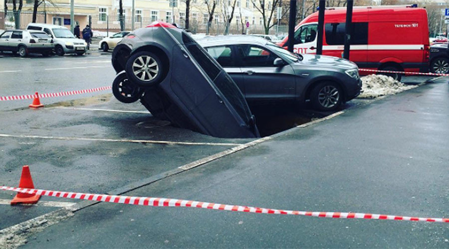 Click to enlarge Moscow parking space sinkhole