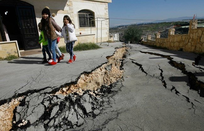 Click to enlarge Road collapse after two large cracks mysteriously appeared in the village of Bissarieh in Lebanon.