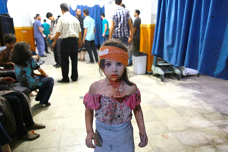 Click to enlarge wounded girl
