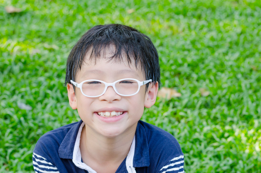 Click to enlarge Child with glasses