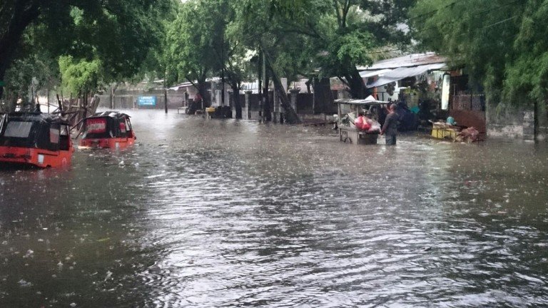 Flooding in the streets of Jakarta, 26 February 2016. 