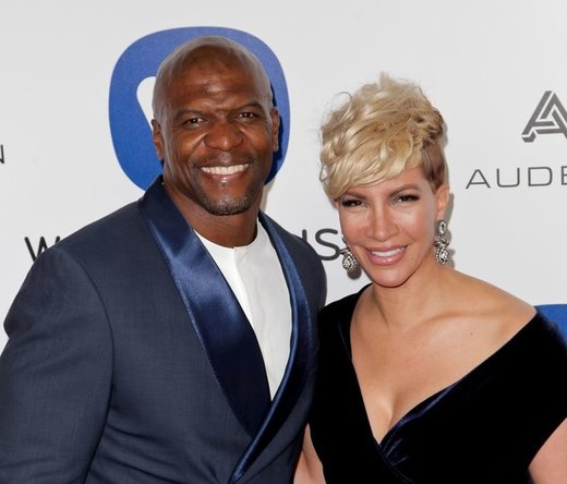 Click to enlarge Terry Crews and wife, Rebecca King-Crews