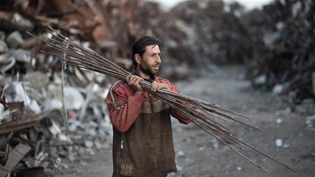 gaza man rebuilding