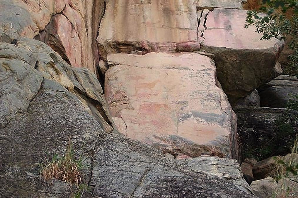 Click to enlarge Rock paintings in Tsodilo Hills, Botswana