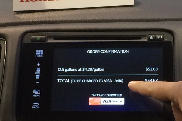 Honda and Visa showed the ability to pay for gas and parking in-car and without a credit card. 