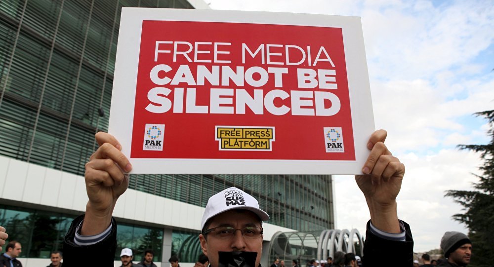 Click to enlarge Zaman newspaper protester