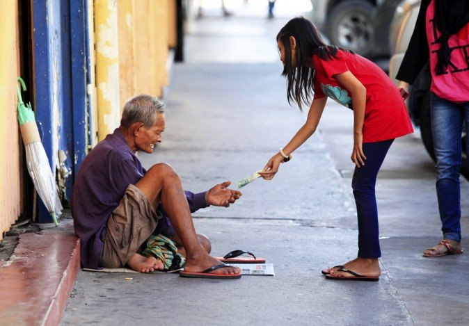 Click to enlarge child helping
