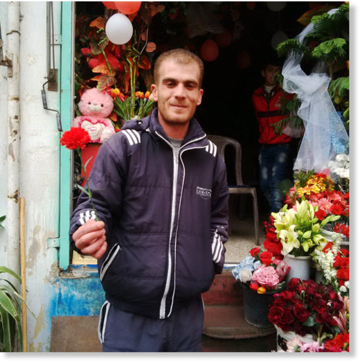 A flower vendor in Sweida