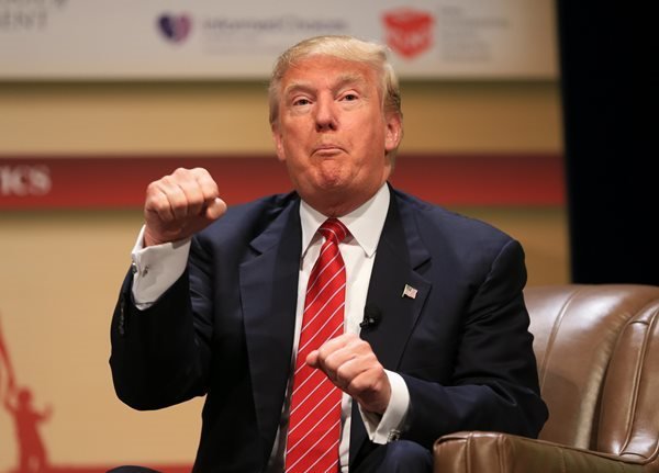 Click to enlarge Trump with fists