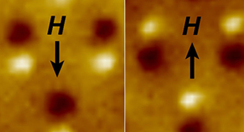 Magnetic microscope image of three nanomagnetic computer bits