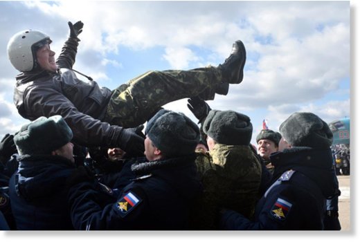 Click to enlarge Russian pilots return from Syria