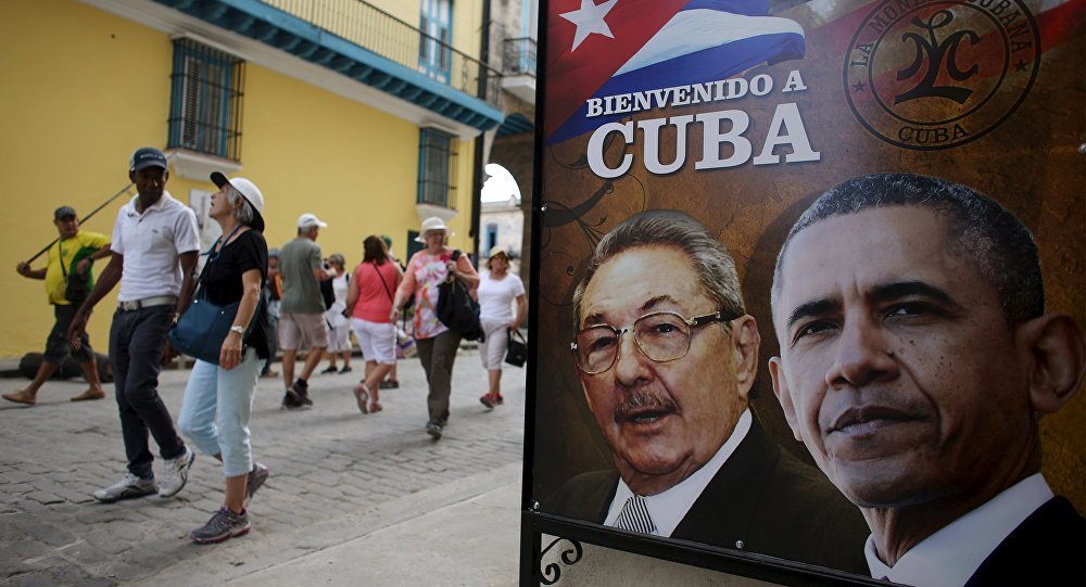Click to enlarge photo of obama in picture in cuba