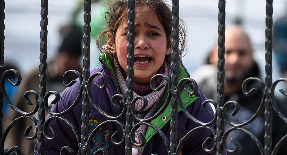 Click to enlarge refugee child crying