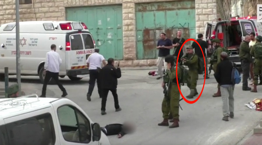 IDF scum murdering injured Palestinian