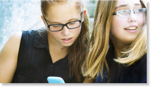 Click to enlarge teens using cellphone