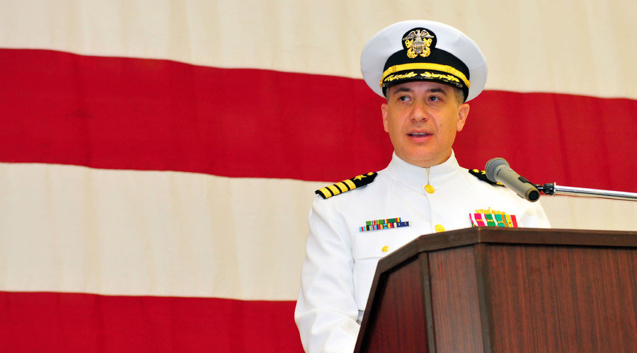 Click to enlarge Capt. Daniel Dusek assumes command of USS Bonhomme Richard in this June 2012 file photo by US Navy Specialist 1st Class Terry Matlock.