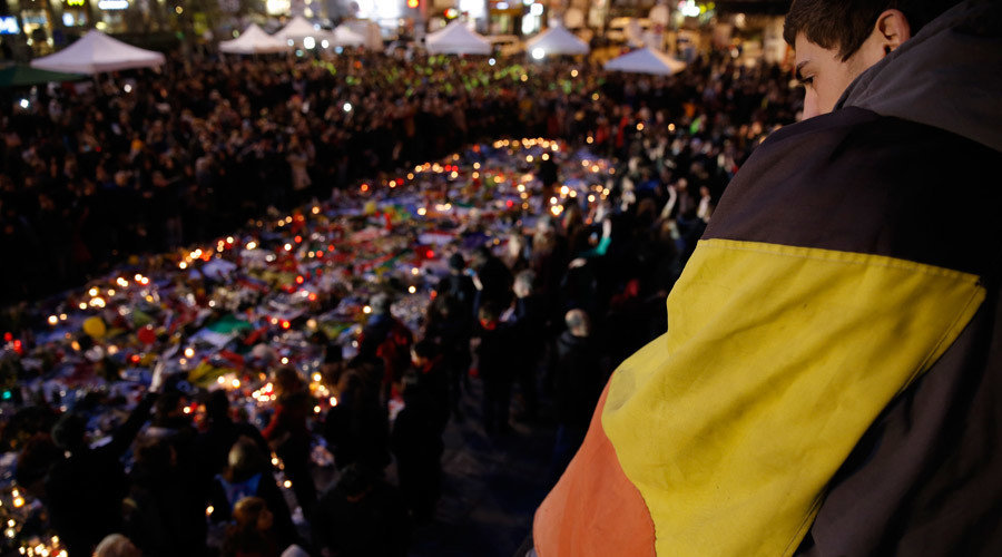 belgian flag draped man