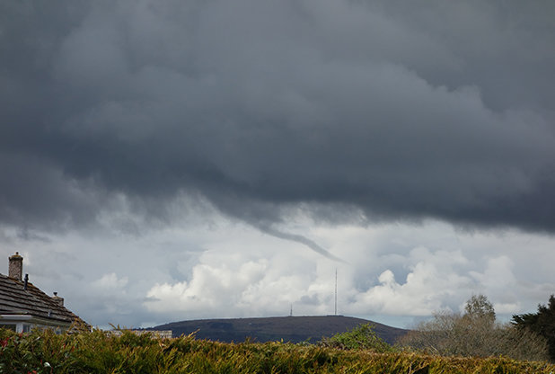 As huge thunder clouds moved in, Alan spotted something strange  