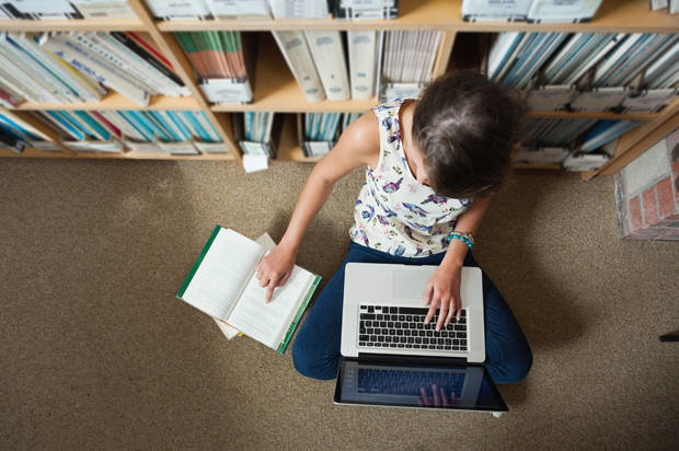Click to enlarge kid in library