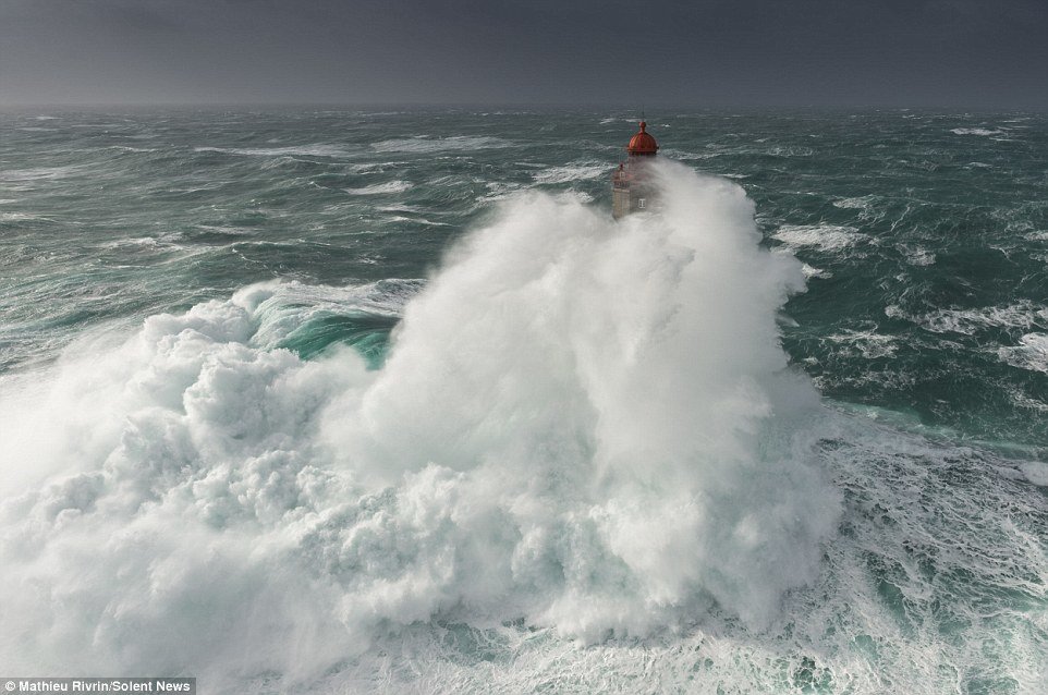 Click to enlarge The winds, which were blowing at 85mph during the storm frenzy, helped drag the wave up and over the tall building