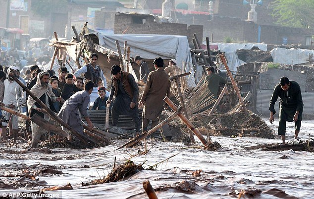 Seasonal rains are a big problem in Pakistan every year and these people on the outskirts of Peshawar have been left wading in water