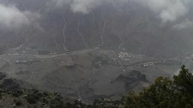 Picture shared on social media shows rainwater running off from mountains to a valley in Oman. 