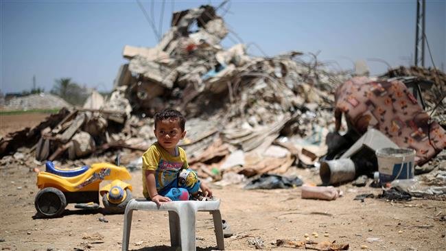 Palestinian child amidst rubble