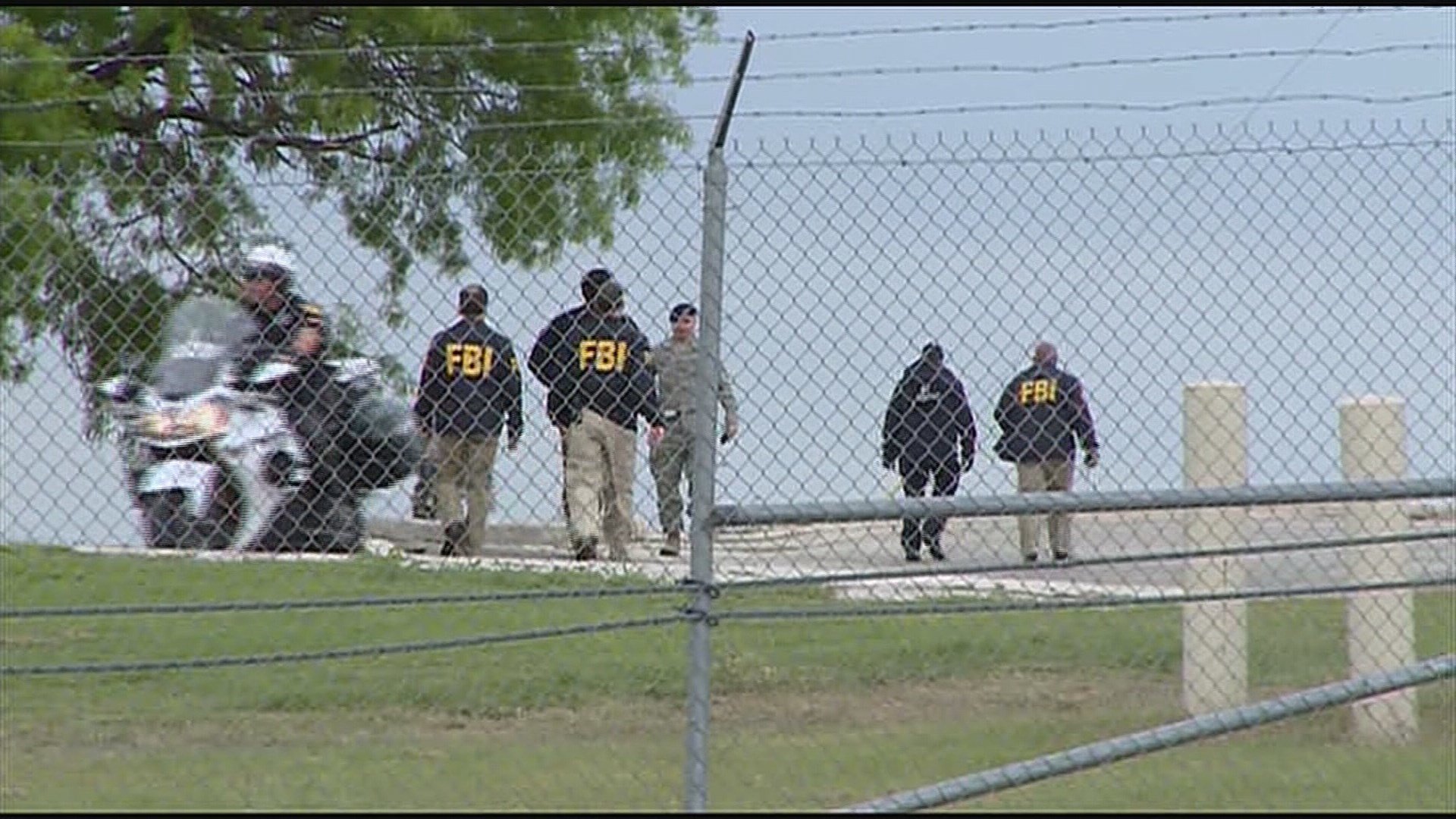 Click to enlarge FBI agents