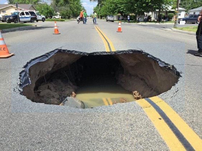 Video shows massive sinkhole open up on street in California — Earth