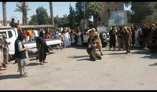 Click to enlarge ISIL beheading an al-Qaeda leader in Raqqa in June 2015