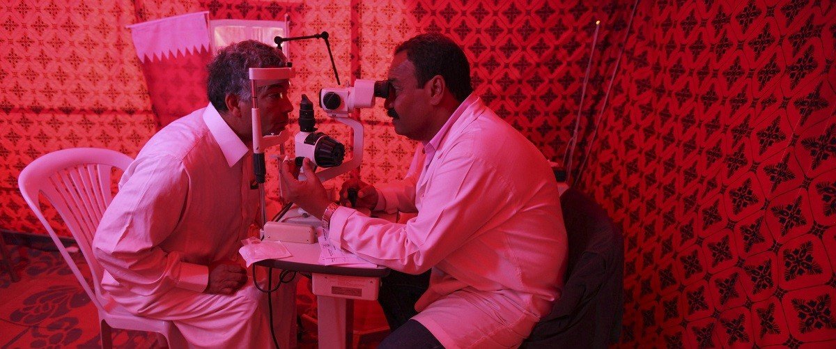 Doctor and refugee patient